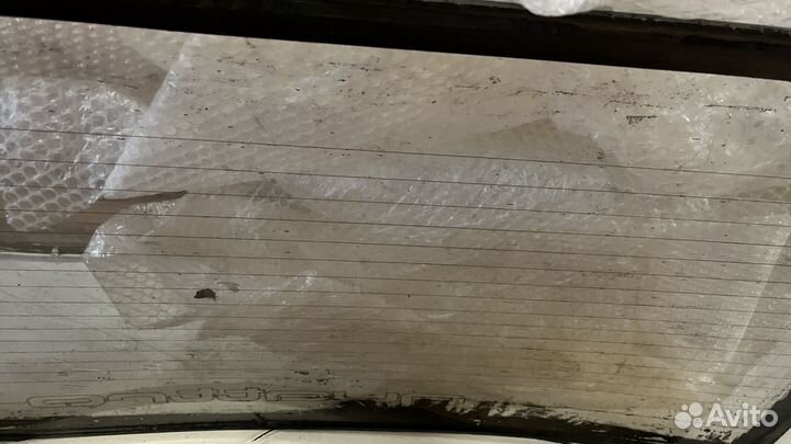 Стекло заднее Ауди 100 Quattro