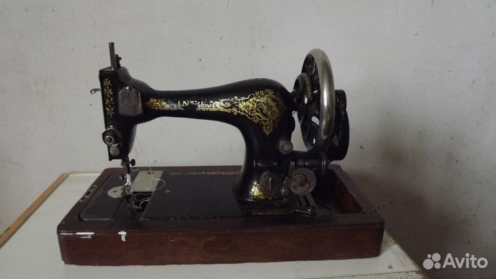 Швейная машинка Зингер