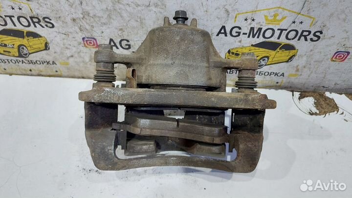 Суппорт тормозной передний левый Solaris I