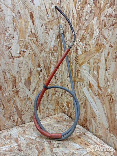 Трос стояночного тормоза центральный Renault