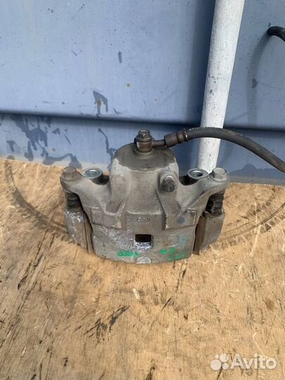 Суппорт тормозной Nissan Teana J31 vq23de левый