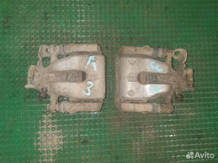 Суппорт тормозной задний Opel Astra GTC H