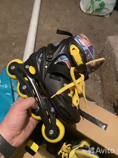 Роликовые коньки