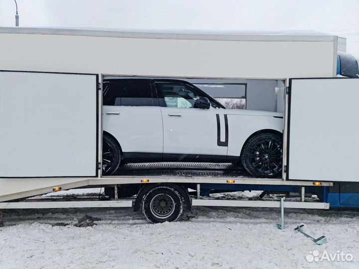Крытый эвакуатор автовоз