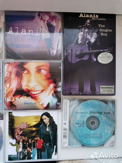 Alanis Morissette коллекция дисков, книг, журналов
