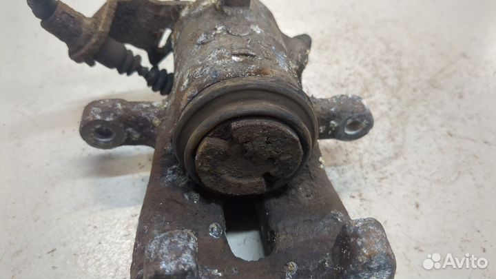 Суппорт левый задний Opel Zafira B