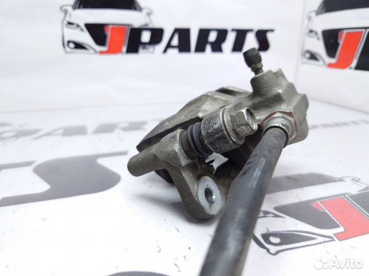 Суппорт задний правый Mitsubishi Lancer 10