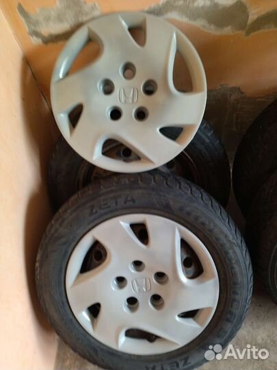 Продам б/у зимние шины штампы + колпаки