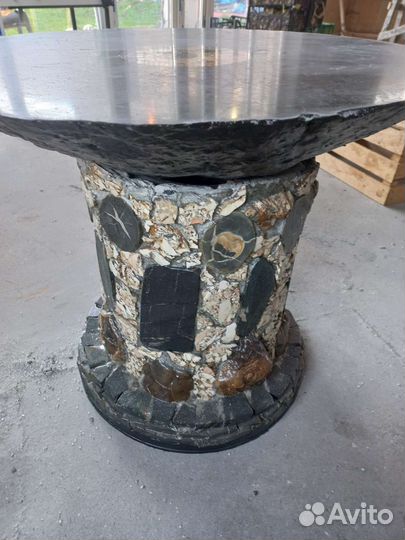 Столы из камня аммонитов