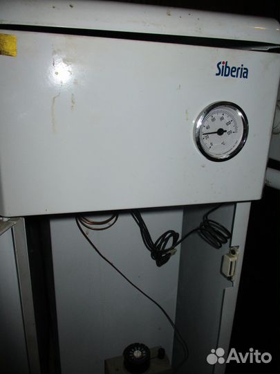 Газовый котёл отопления двуконтурный напольный