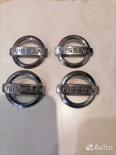 Эмблема ниссан