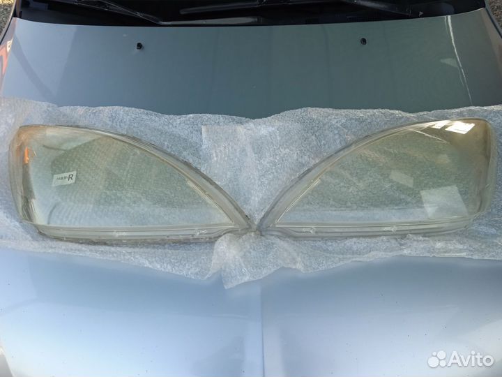Стекла на фары Лансер 9