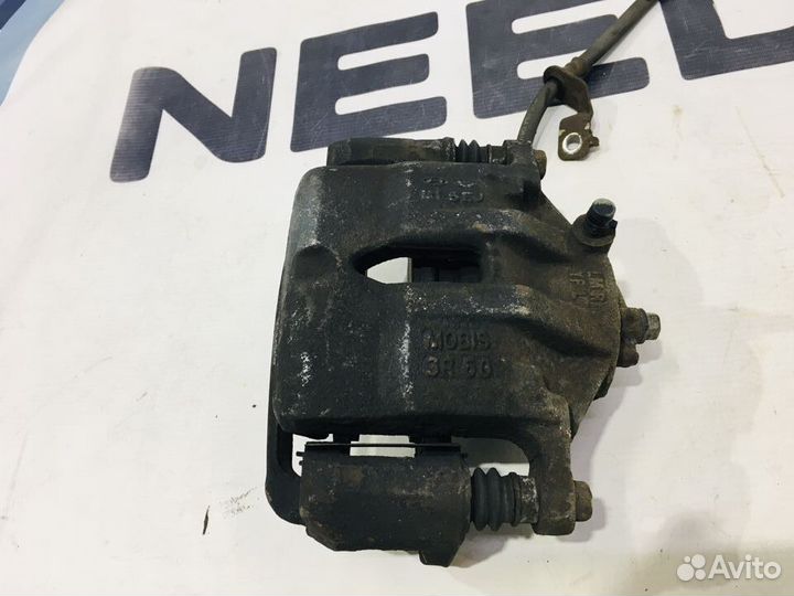 Суппорт передний правый kia sportage 3