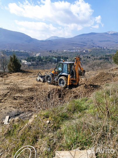 Экскаватор погрузчик