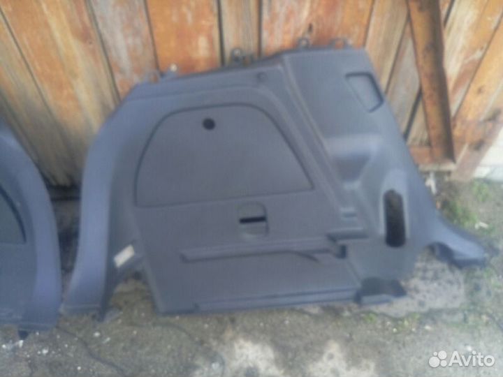 Обшивка багажника Opel Corsa D