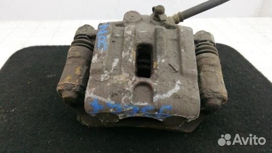 Суппорт тормозной задний правый KIA carens 3 (93E2