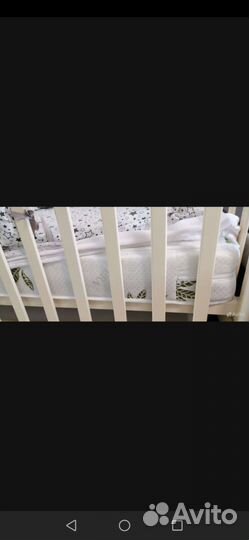 Детская кроватка с маятником и ящиком