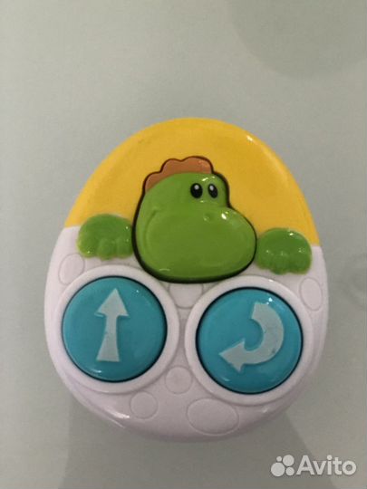 Игрушечный динозавр на пульте
