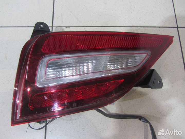 Фонарь задний противотуманный левый