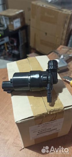 Моторчик омывателя фар Mitsubishi 8264A228