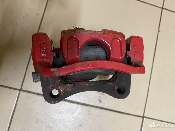 Суппорт задний левый Kia Optima 4 Рестайлинг