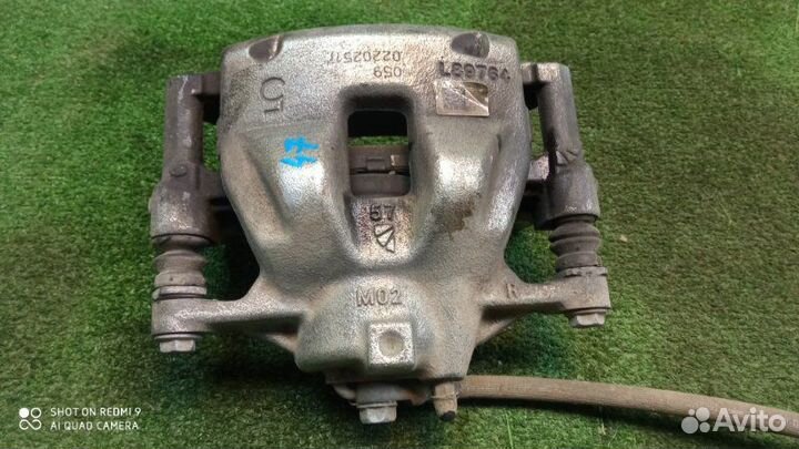 Суппорт тормозной передний правый Toyota Corolla