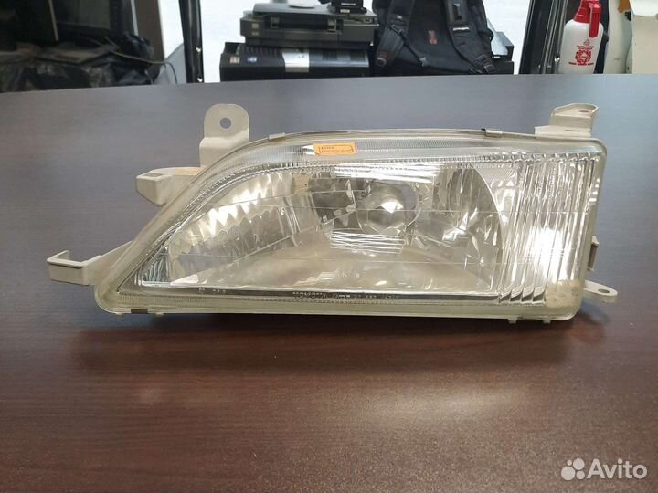 Фара левая Toyota Carina 96-01 арт 811702B680