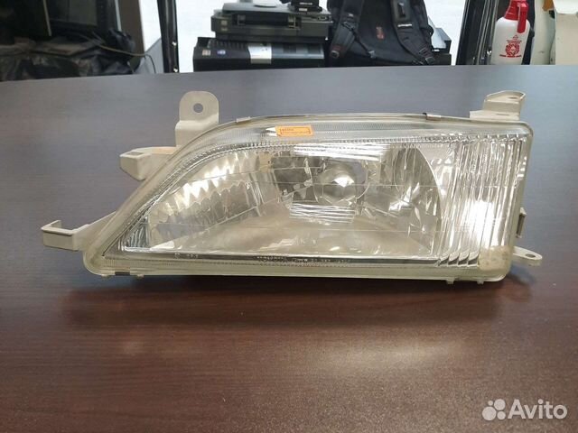 Фара левая Toyota Carina 96-01 арт 811702B680