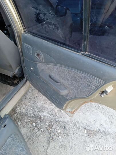 Обшивка двери Дэу Нексия