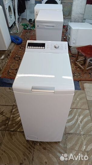 Стиральная машина с вертикальной загрузкой Bosch