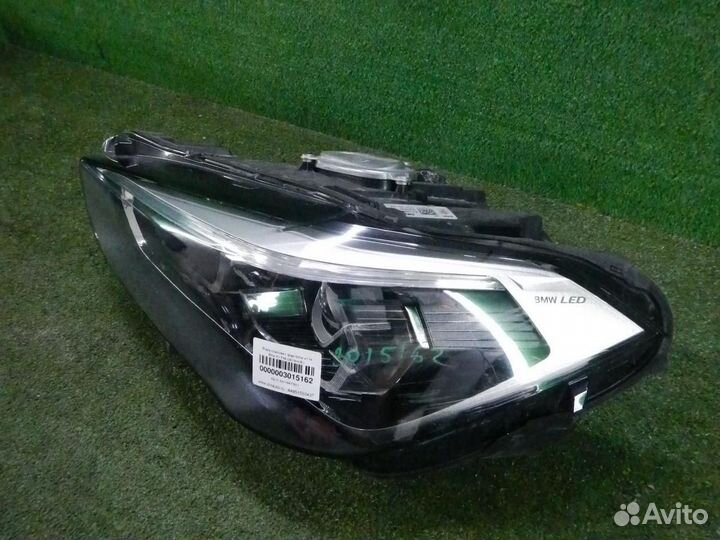 Фара левая BMW X1