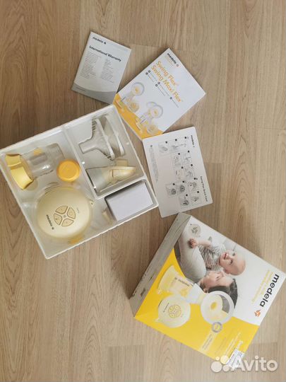 Молокоотсос электрический medela swing flex