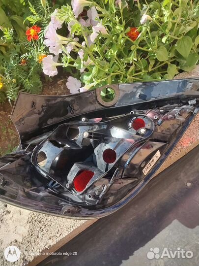 Задний фонарь Опель астра н хэтчбэк