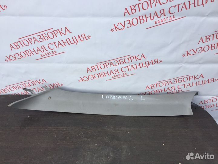 Обшивка передней стойки левая Mitsubishi Lancer 9