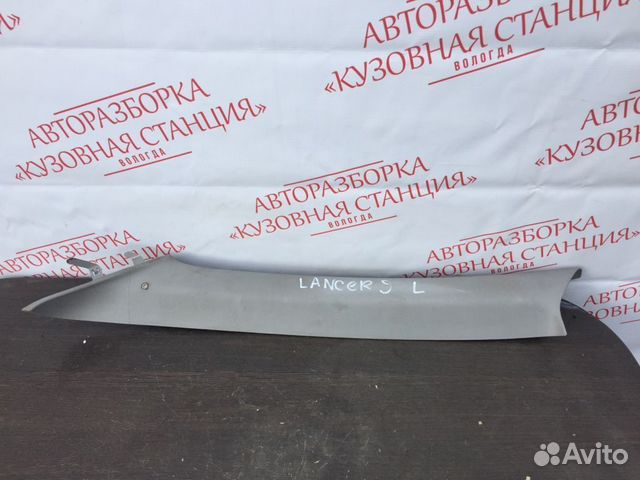 Обшивка передней стойки левая Mitsubishi Lancer 9