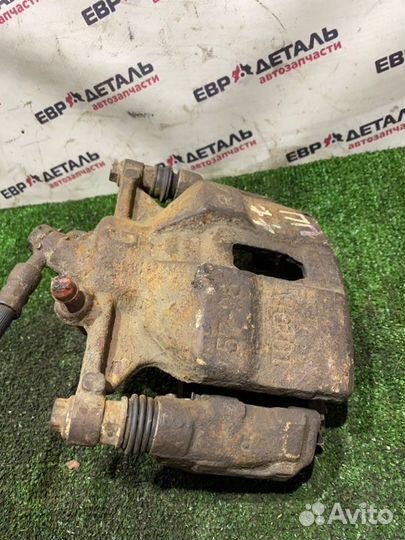 Суппорт тормозной передний правый Toyota Carina E