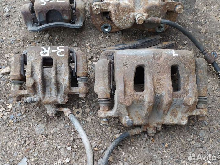 Суппорта тормозные SsangYong actyon 2011 года