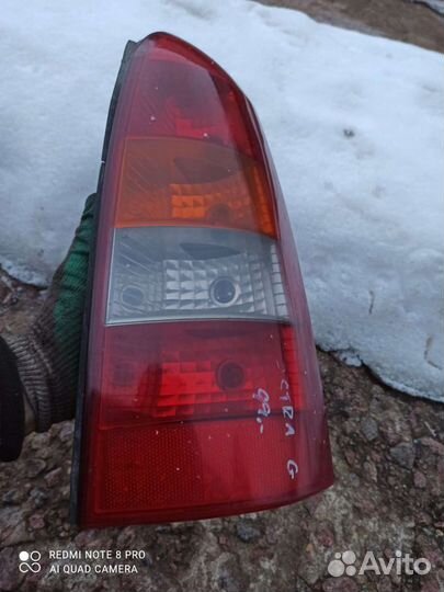 Opel Astra G (универсал) фонарь правый оригинал