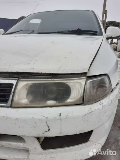 Фара левая Mitsubishi Lancer 7