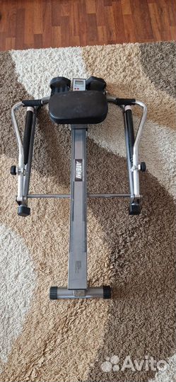 Гребной тренажер