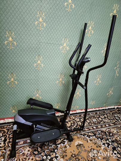 Эллиптический тренажер torneo
