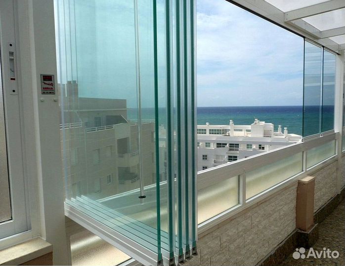 Безрамное раздвижное остекление