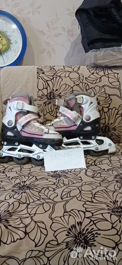 Роликовые коньки