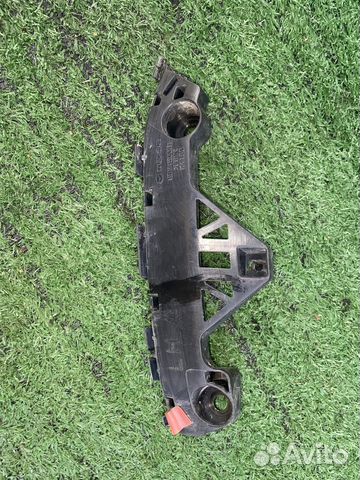 Кронштейн крепления бампера левый Mazda Axela BL5F