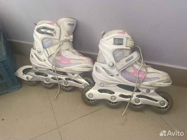Роликовые коньки