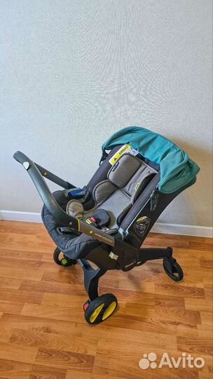 Коляска-автокресло Doona с базой