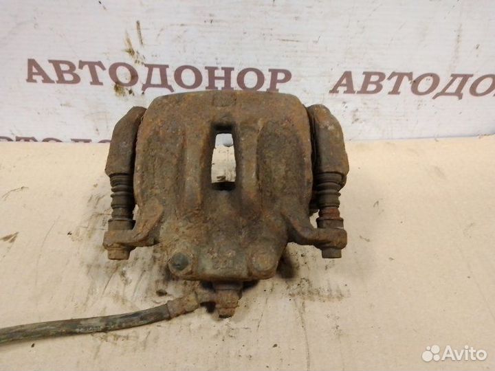 Суппорт тормозной передний правый Nissan Murano