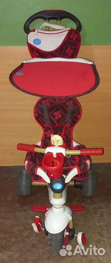 Трехколесный велосипед с ручкой