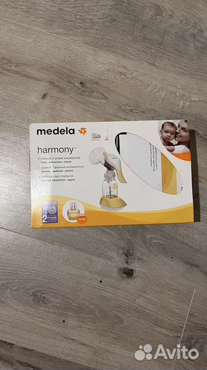 Молокоотсос medela ручной