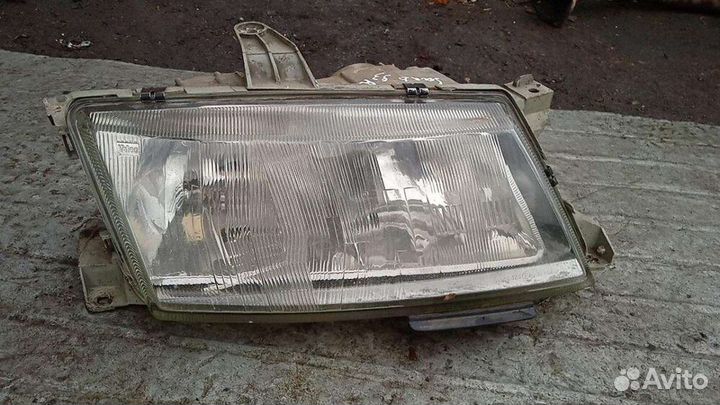 Фара Saab 9-3